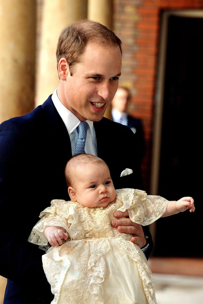 The Duke of Cambridge holds Prince George at Chapel Royal in St James's Palace for the three-month-old's christening by the Archbishop of Canterbury on October 23 in London.

Photo: Getty