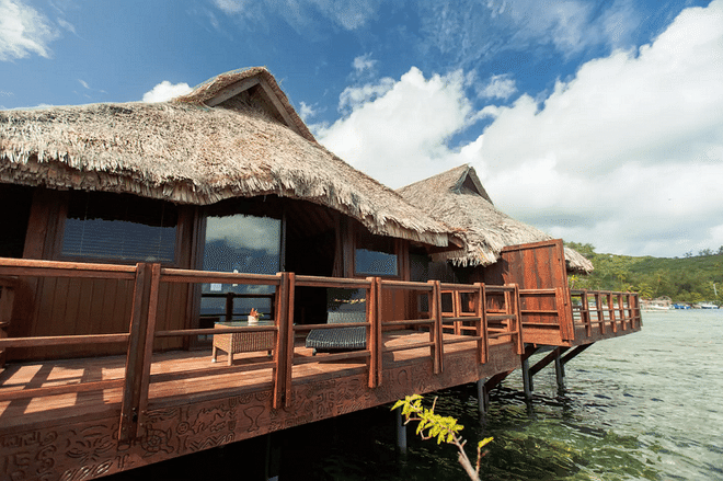 Typically a favorite for celebs and honeymooners, Bora Bora welcomes all sunbathers, nightlife savants, and thrill-seekers. Do it up right with this beach bungalow. Photo: Airbnb