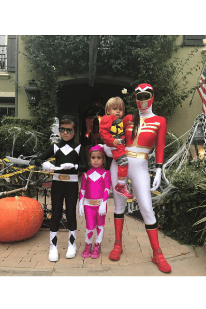 Kourtney, Mason, Penelope and Reign dressed up as a family of Power Rangers.