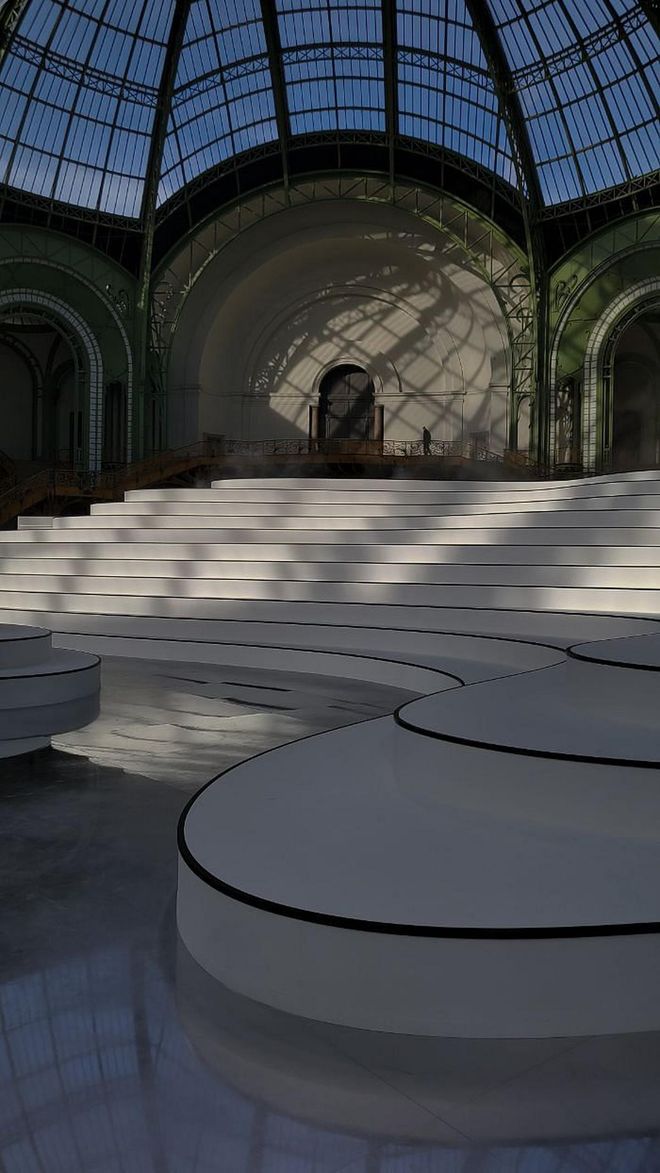 The meandering tiers of guest seating at Chanel referenced the brand's iconic black and white.