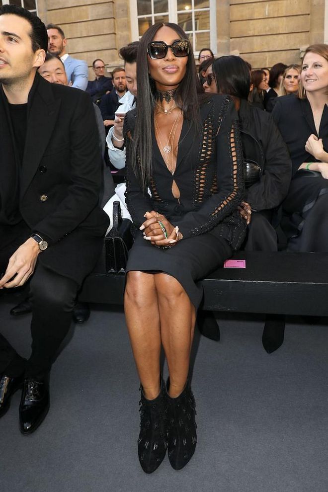 Naomi Campbell wore a black ensemble and statement sunglasses for the L'Oreal show.

Photo: Getty