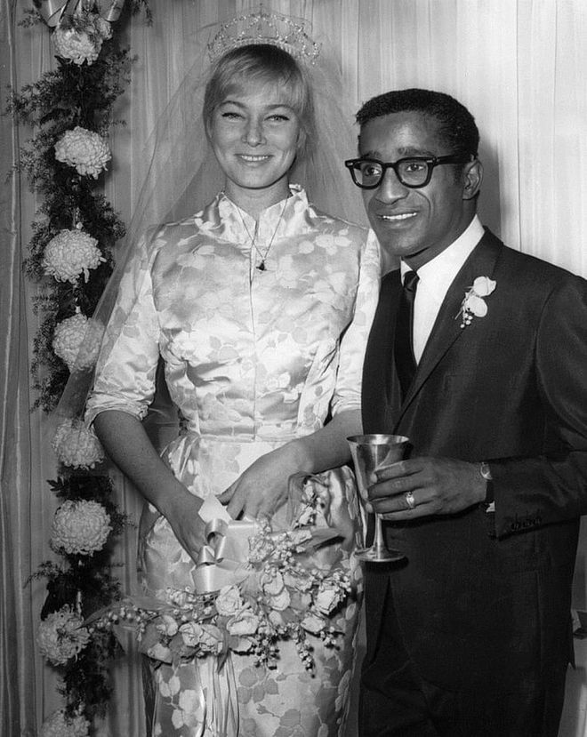 Marrying Sammy Davis Jr. in 1960. You know someone would give their left elbow for this at a vintage store. 
