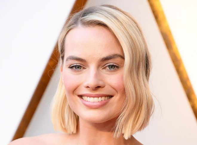 Margot Robbie wore a white Chanel gown to the Oscars this year—and in doing so gave us major bridal beauty inspo. Nude lipstick and a rosy blush are wedding signatures, but we love how she mirrored the whiteness of her gown with a shimmery silver eyeshadow across her lids.
Photo: Getty