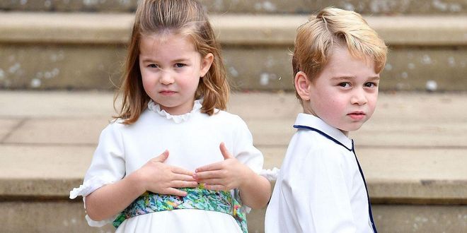 Three-year-old Princess Charlotte and five-year-old Prince George preparing to walk down the aisle with the bride.