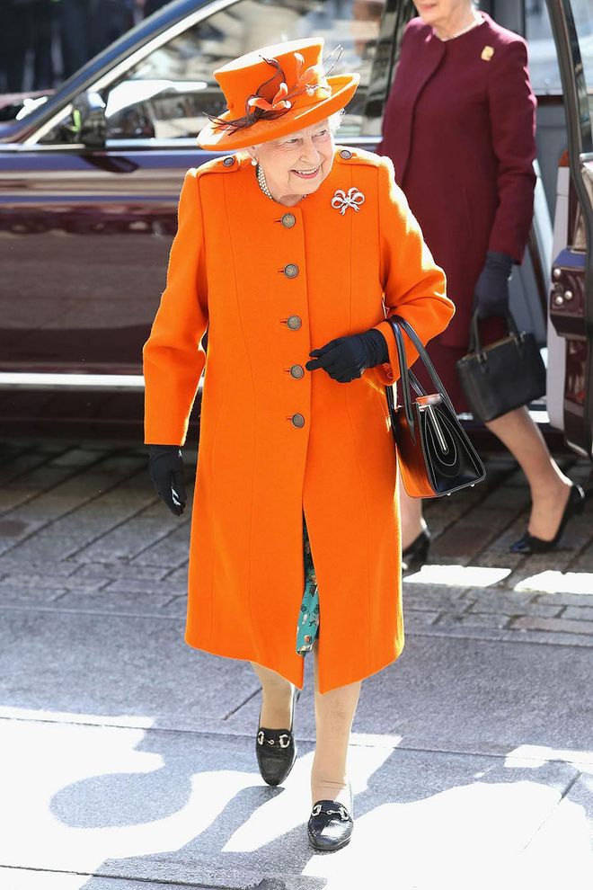 You'd be hard-pressed to find a photo of Queen Elizabeth NOT wearing bold colors — and for good reason. In the documentary The Queen at 90, Sophie, Countess of Wessex (the Queen’s daughter-in-law) said, "She needs to stand out for people to be able to say 'I saw the Queen.’”

If she's wearing one of her brightly-hued monochromatic outfits, the public can easily catch a glimpse of her in a large crowd. According to the Queen’s biographer, Robert Hardman, she was quoted as saying, "I can never wear beige because nobody will know who I am."
Photo: Getty