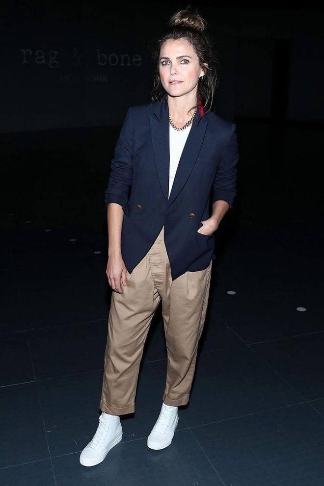 Keri Russell attended the show in beige trousers and a buttoned-up blazer.

Photo: Cindy Ord / Getty