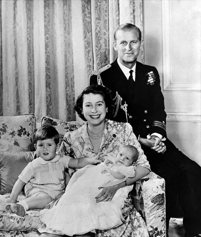 Elizabeth and Philip welcomed Princess Anne in August 1950. In one of the royal family of four's earliest group photos, Prince Charles sweetly points at his baby sister.
Photo: Getty