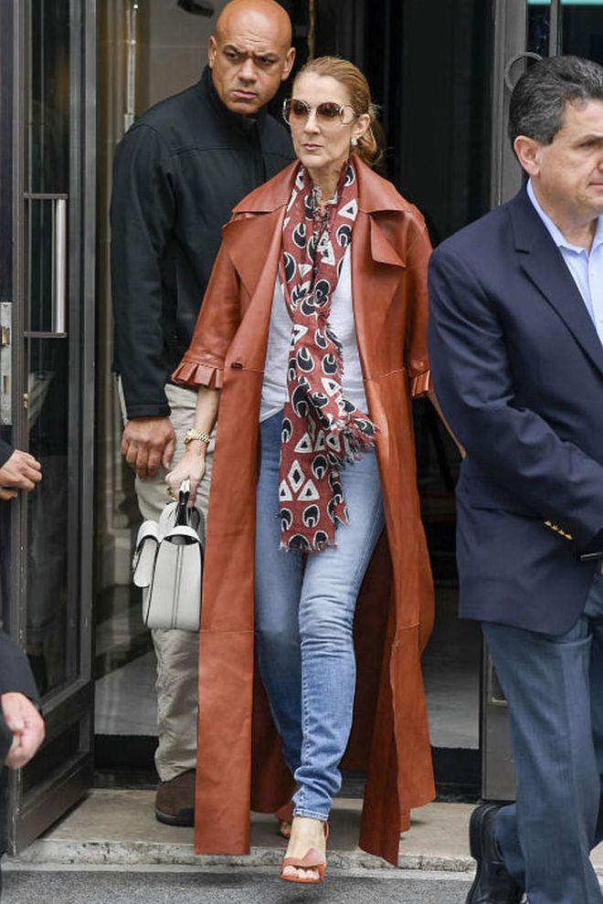 In an Off-White leather trench coat, Chloé scarf, and Celine bag, walking the streets of Paris.
Photo: Splash