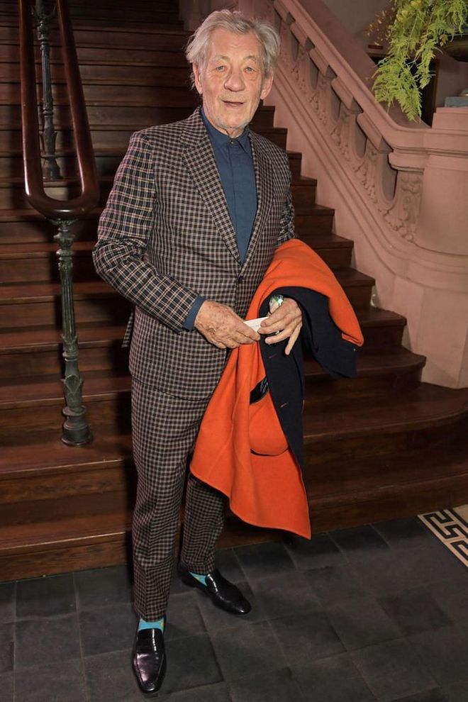 Ian McKellen wore a checked suit and bright turquoise socks for the event. wore a checked suit and bright turquoise socks for the event.