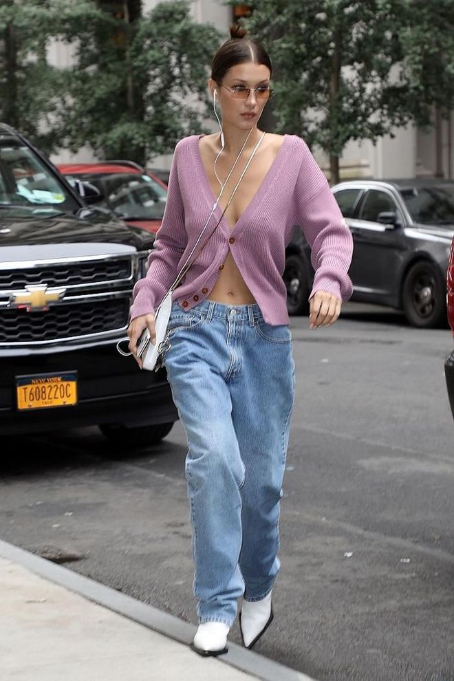 Running errands in NYC in a pink Vivienne Westwood cardigan and straight leg jeans. 