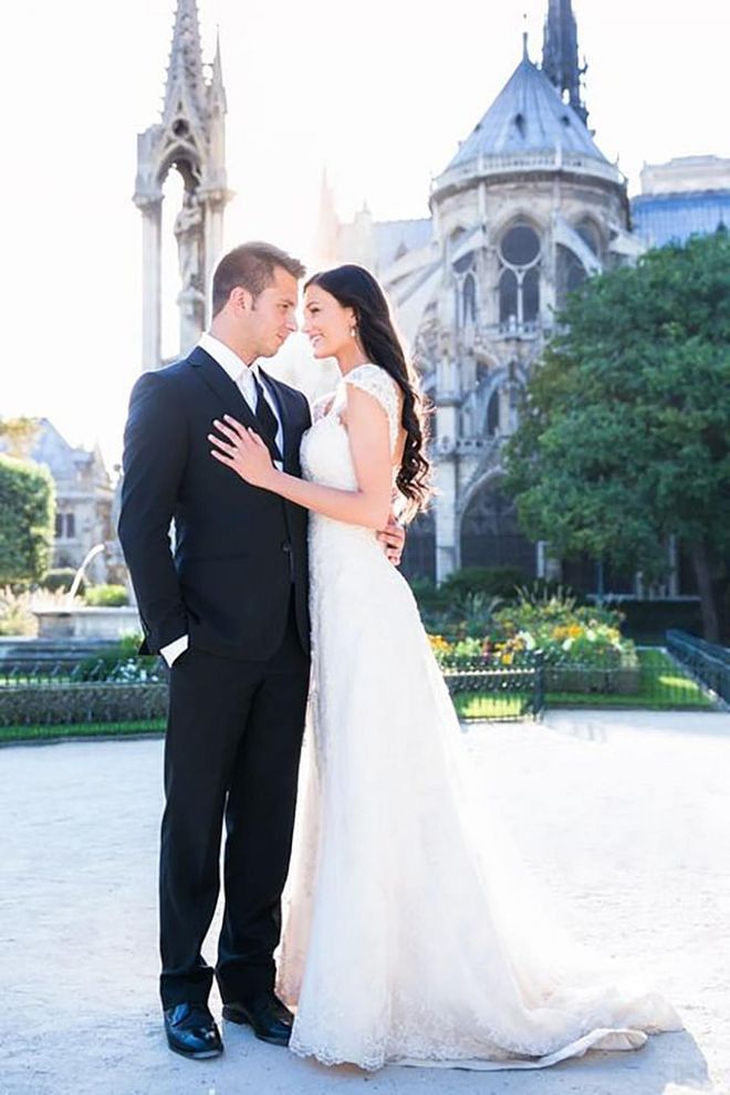 Between the historic architecture of Notre Dame and the gorgeous lighting, a couple's embrace in the gardens behind the cathedral makes for an unforgettable wedding day snapshot.

Via One and Only Paris Photography

