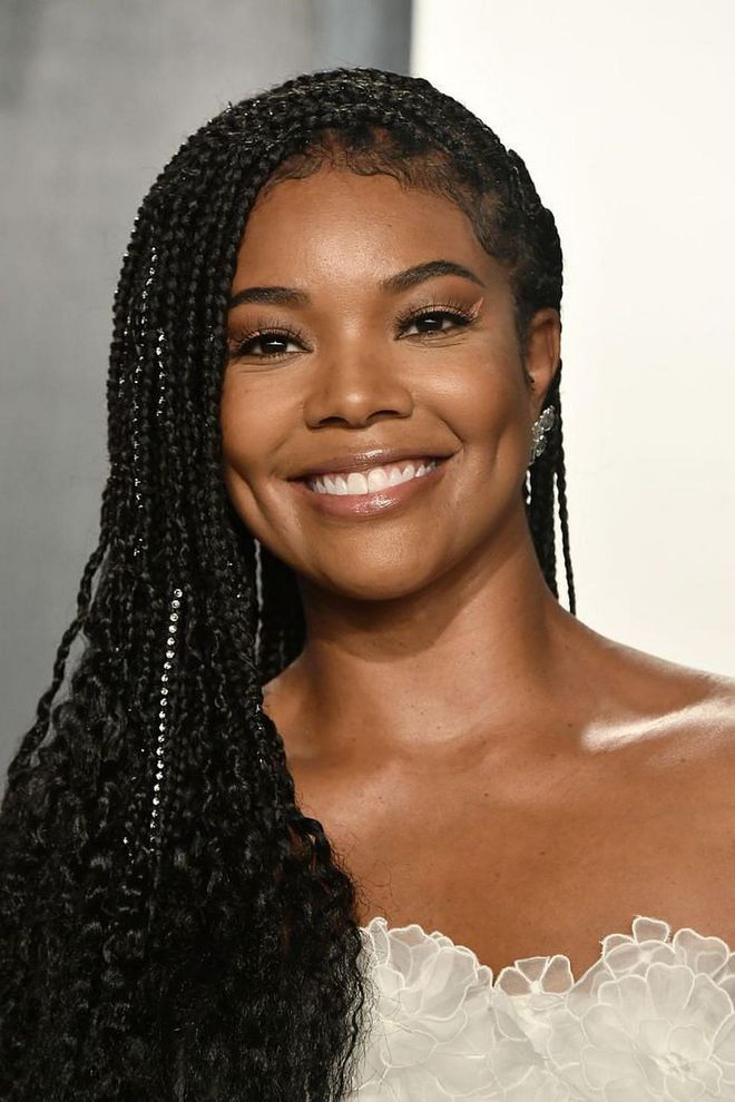 Gabrielle Union looked glowing as usual, but with the added sparkle of rhinestones perfectly placed in her braids.

Photo: Frazer Harrison / Getty