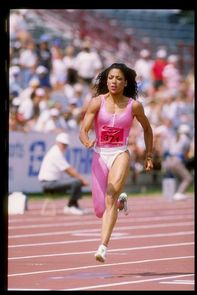 Florence Griffith-Joyner runs down the track during the Olympic trials in 1988. (Photo: Tony Duffy/Getty Images)