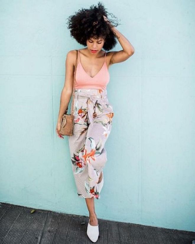 Millennial pink acts as the perfect neutral when styled with a pair of colorful printed pants.

Photo: Instagram via @grasiemercedes
