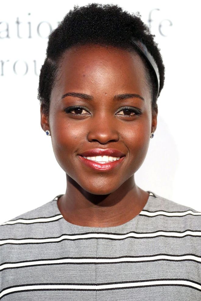 Lupita Nyong'o proves that you can still wear a hair barrette with ultrashort hair. For extra definition, work a razor-sharp part in.