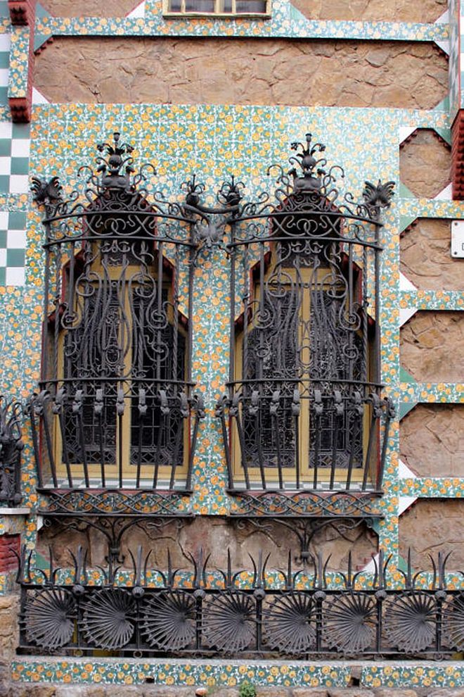 Gaudí drew from Moorish influences and relied heavily on ironwork and ceramic tiles to decorate the facade of the house.