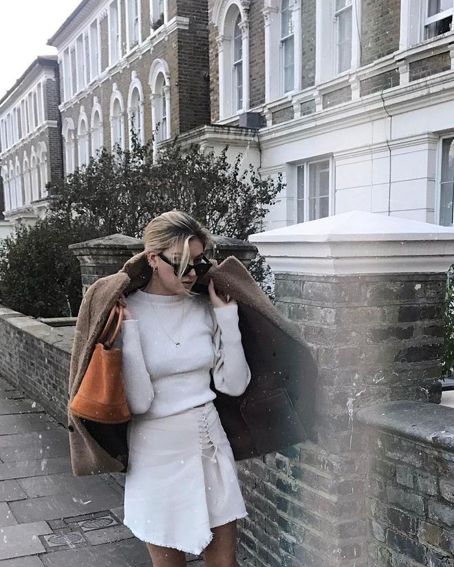 This raw-hem, white denim skirt has been all over our Instagram feed – and we can see why.