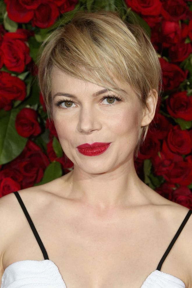 It's almost as if Williams knew her lips would match the red roses at the Tony Awards.

