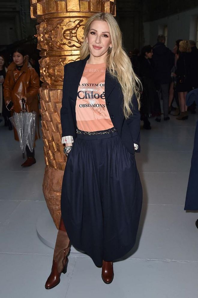 Ellie Goulding styled a peach coloured t-shirt with a blazer and skirt.

Photo: Dominique Charriau / Getty