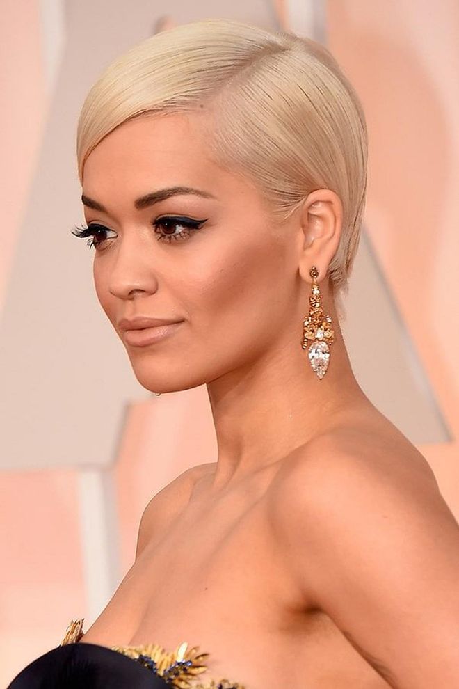 Rita Ora’s side-parted, sleekly-combed hair is the perfect evening hair look for a pixie cut.
