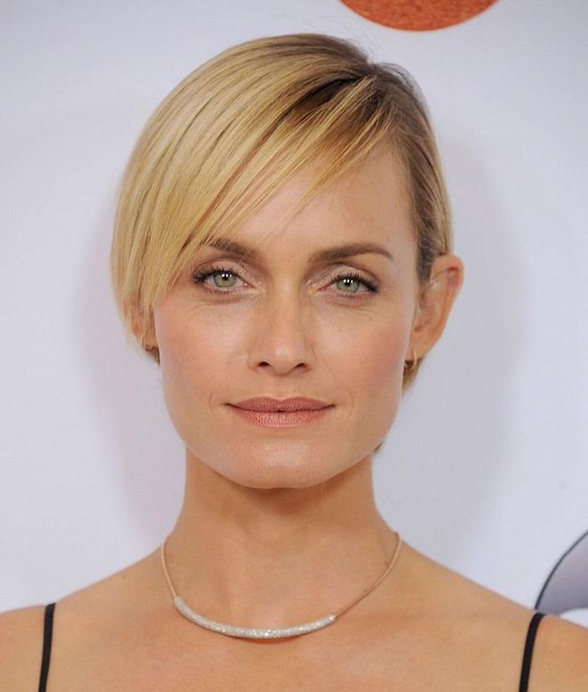 One of the sleekest short cuts ever? Here, the supermodel shows us what it looks like when you ask your stylist to take your bob up an inch, cut slightly cropped side-swept bangs, and apply a super-conditioning hair mask. 