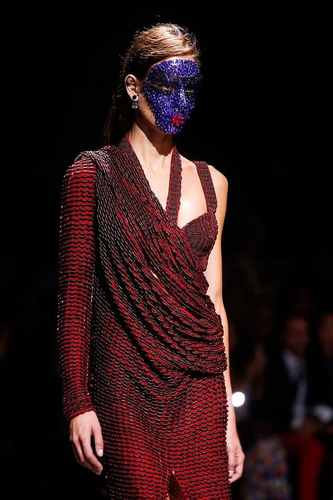 Pat McGrath created epic crystal face masks (that took 12 hours to apply) for the label's Spring 2014 show. Photo: Getty 