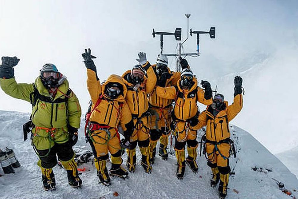 Members of the multidisciplinary team pose for a portrait after successfully installing weather stations on Mt Everest. <br />Photo: Courtesy of the National Geographic Society