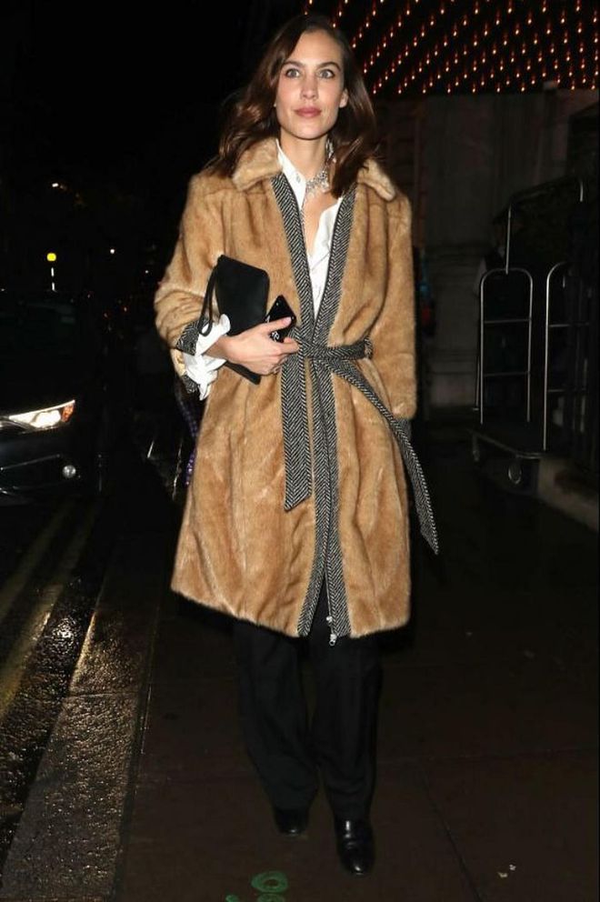 Alexa Chung wrapped up in a cosy brown fur coat in London.

Photo: Ricky Vigil M / Getty