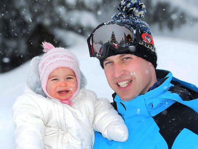 A smiling Prince William and Princess Charlotte pose in their ski outfits while on a vacation to the French Alps.

Photo: Getty
