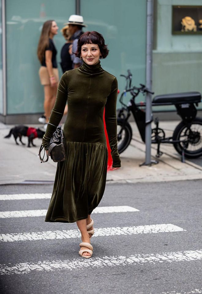 NEW YORK, NEW YORK - SEPTEMBER 09: Alyssa Coscarelli wears green velvet dress outside Proenza Schouler on September 09, 2023 in New York City. (Photo by Christian Vierig/Getty Images)
