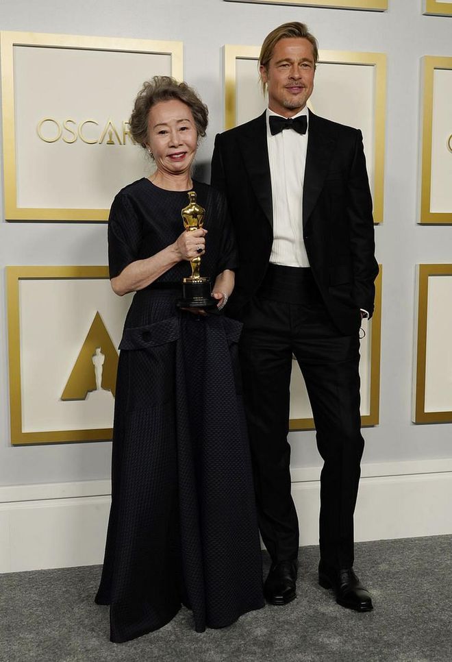 Brad Pitt Brought His Tiny Ponytail To The Oscars