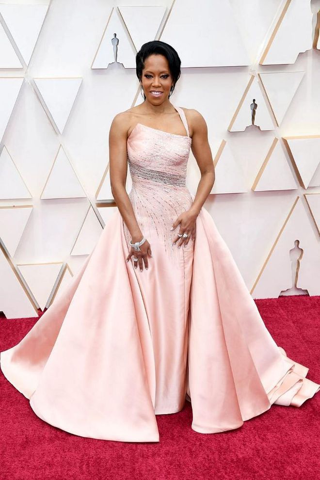 In an asymmetrical icy pink Versace number and Harry Winston jewels.

Photo: Kevin Mazur / Getty