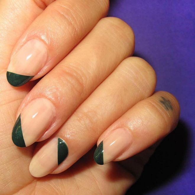 Metallic hunter green gives this diagonally painted French an on-trend utilitarian vibe. 
@nataliepavloskinails