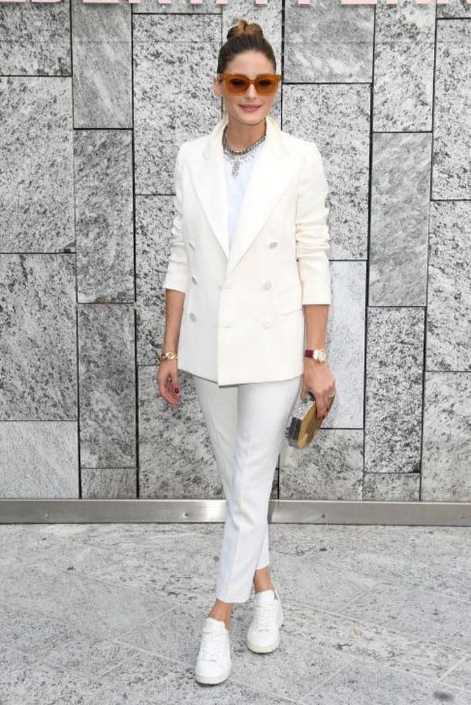 Olivia Palermo broke up her all-white ensemble with a pair of oversized tan sunglasses.

Photo: Getty