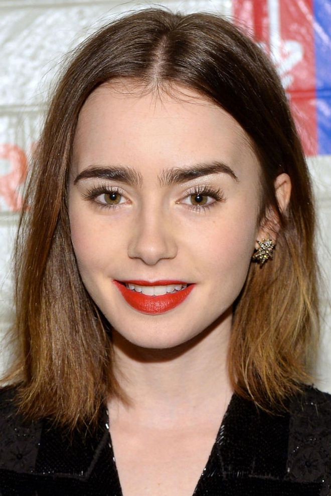 For Lily Collins's wash-and-go style, just add texturizing spray to air-dried tresses.