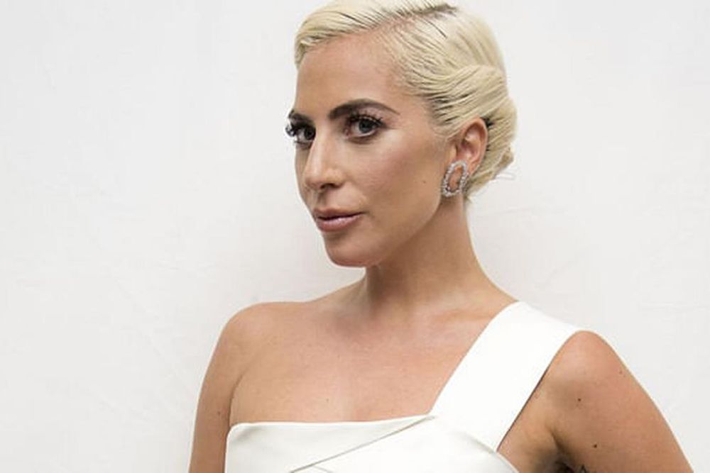 hbsg-lady-gaga-at-the-a-star-is-born-press-conference-at-the-news-photo