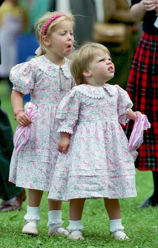 In 1988, Prince Andrew and Sarah, Duchess of Ferguson welcomed their first daughter, Princess Beatrice. Beatrice was joined by a younger sister, Princess Eugenie, two years later. The royals are photographed here wearing matching outfits at the Royal Windsor Horse Show in 1992.
Photo: Getty 