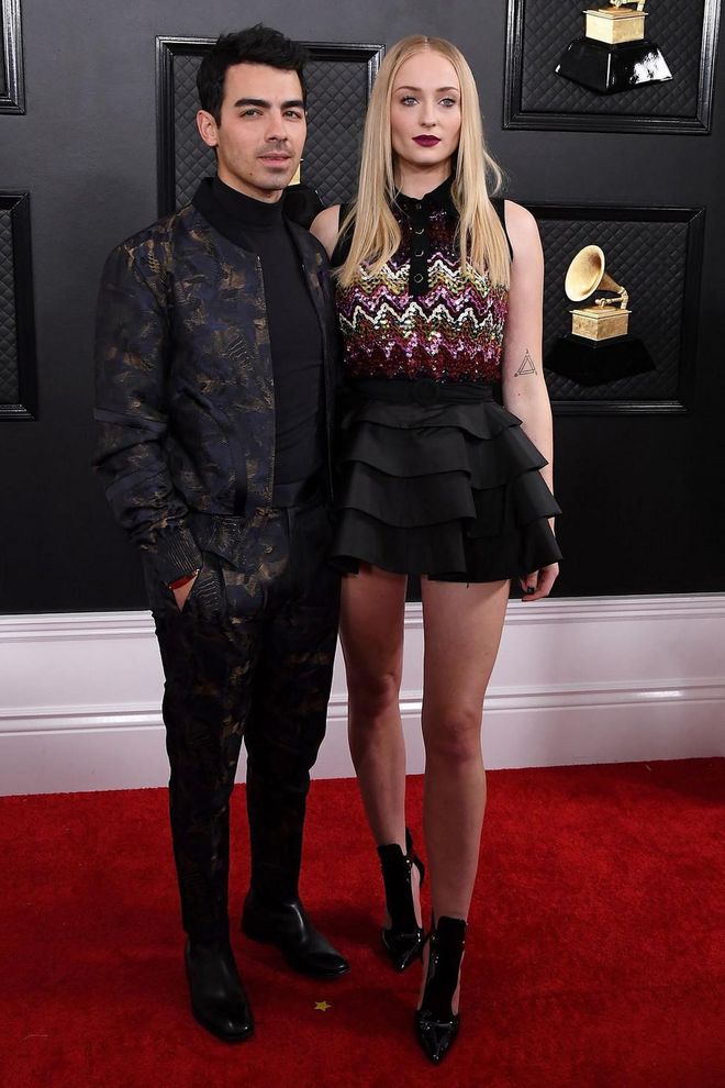 Chopra's sister-in-law, Sophie Turner, also turned heads on the Grammys red carpet, but she chose an entirely different vibe for the night. The actress shunned the gown, opting for a ruffled mini skirt, bejewelled top and pointed cut-out boots by Louis Vuitton for the evening. Photo: Getty