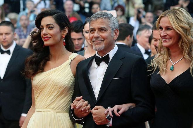 George Clooney Recalls the Awkward Moment He Had to Kiss Julia Roberts in Front of Wife Amal