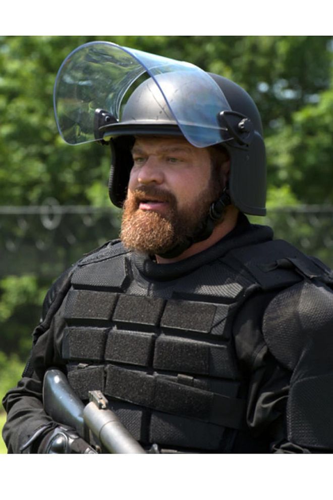 Commanding and controlling, season 4's antagonist is this tall, bearded hunk of a guard. Photo: Netflix