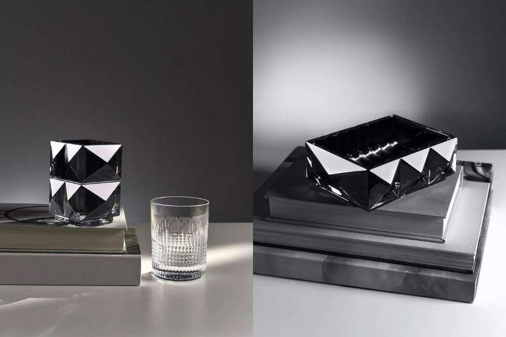 (From left) Baccarat louxor pencil holder in black crystal; Baccarat nancy and louxor glasses. Baccarat louxor pin tray in crystal