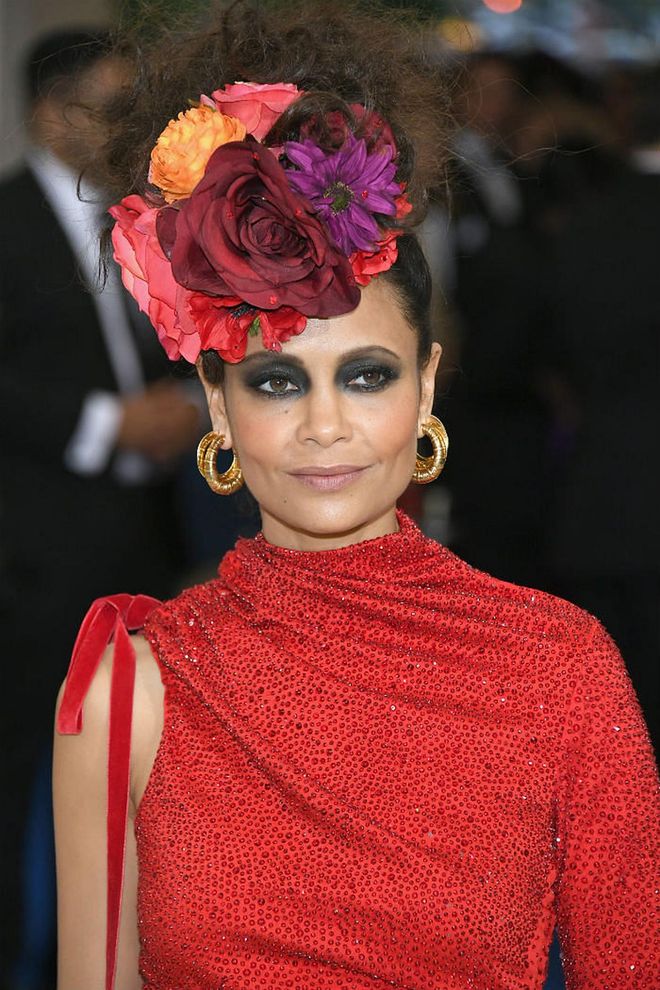 Always regal and glamorous, Newton takes on a Frida Kahlo-esque artistic approach this time, sporting a gorgeous floral headpiece to the gala (Photo: Getty)