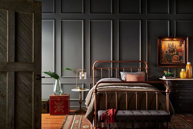 The best way to kick traditional style up a notch? Paint your space a rich color like this dark gray. In this case, the texture of the wall softens the solemn shade.
Get the look: Shades On by Behr. Photo: Behr.