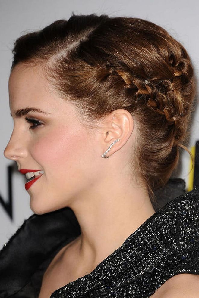 Instead of another bun or ponytail, Watson twists her hair back into a bunch of tiny braids, all tucked and pinned with precision.