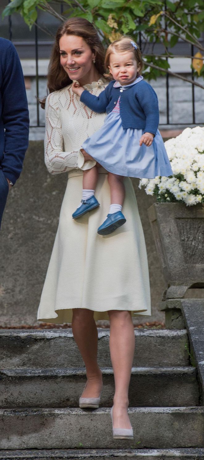 Here she is with an adorable Princess Charlotte.