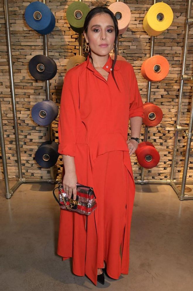 Jessie Ware paired her red dress with a sequinned Mulberry bag to attend the Mulberry: Made to Last dinner.

Photo: David M. Benett / Getty