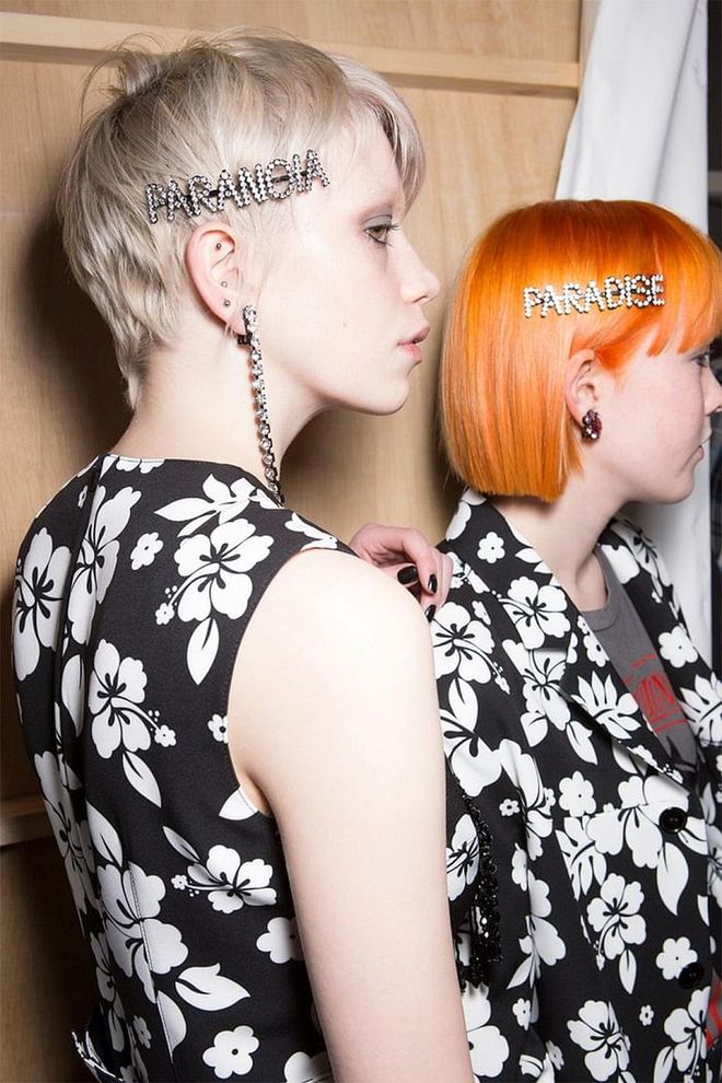 Ashley Williams made quite the splash last season when she sent models down the runway wearing "boys" and "girls" hair pins. This season's slogans were much more fitting for the climate: "paradise" and "paranoia."