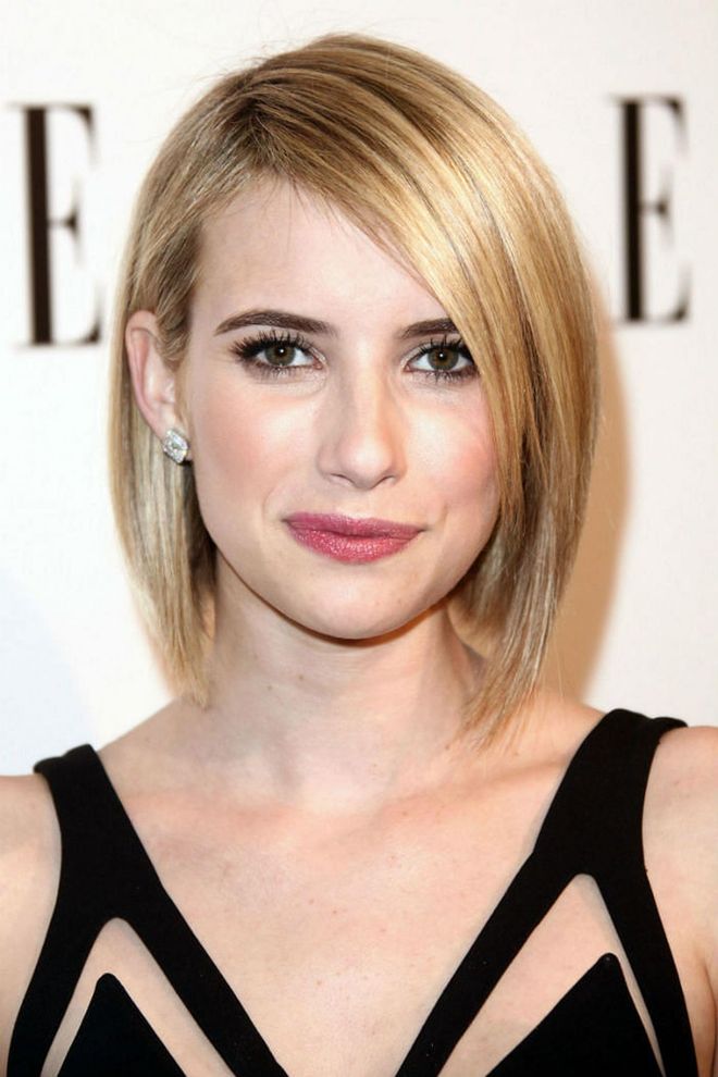 The secret to Emma Roberts' polished style is a flat iron and mist of glossing spray.