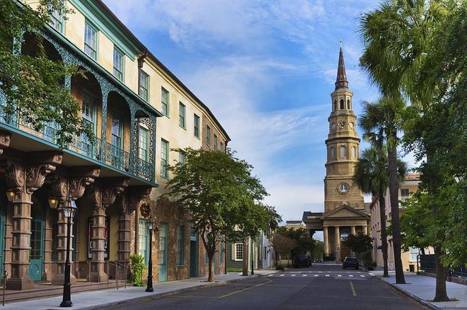 Southern charm is real, y’all, and it’s front and center in Charleston, whether you’re slurping oysters at The Ordinary, sipping some vino at the new Graft Wine Shop &amp; Bar, or checking into the impeccably designed Zero George boutique hotel. A good way to get acquainted with the city is on a horse-drawn carriage tour with Palmetto Carriage Works around downtown. A stroll to the White Point Garden on the waterfront—where you can spot Fort Sumter in the distance—will take you down cobblestone streets lined with envy-inducing houses decorated with flower-filled window boxes. You can get a glimpse inside at a number of historic homes; our favorite is the quirky Calhoun Mansion, where every surface is covered in the owner’s collection of art and antiques.

Fans of The Notebook should subtly make a case for visiting Boone Hall Plantation and Gardens in nearby Mount Pleasant, which was the setting of Allie’s summer home. You’ll feel the magic driving onto the antebellum grounds, thanks to its nearly mile-long driveway lined with towering Live Oak trees, planted back in 1743.
Photo: Getty