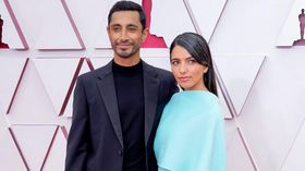Riz Ahmed and his wife, and Fatima Farheen Mirza arrive at the Oscars on Sunday, April 25, 2021. (Photo: Chris Pizzello/Getty Images)